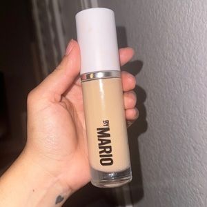 A Mario foundation in the shade light with warm undertone